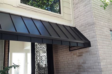 metal front door awning ranch house|ranch style exterior walls.